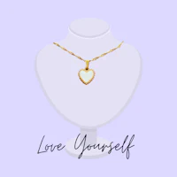 a necklace with the words love yourself on it